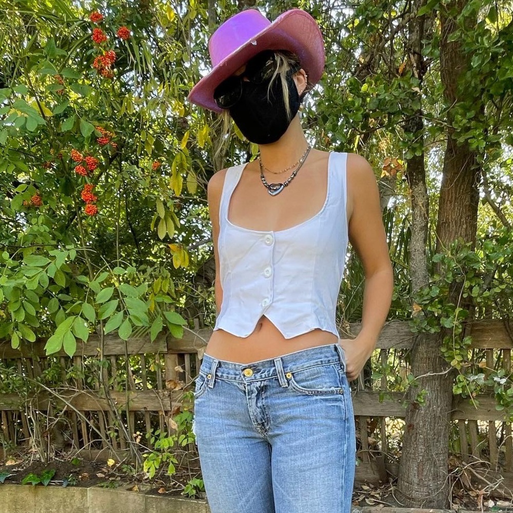 BNWT vest top !! Can be worn alone or over a shirt. So cute but too big on me!